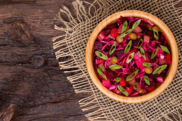 Top view of  beetroot salad Russian Vinaigrette or Vinegret in a