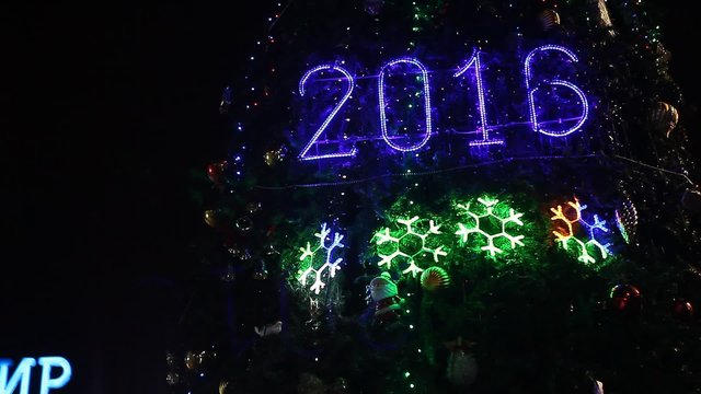 Figures of shone deer with sledge new year tree and 2016 sign