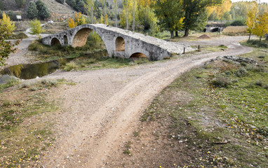 Roman bridge over Pancrudo river in Luco de Jiloca, Teruel, Spain