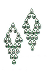 earrings inlaid with precious stones on a white background
