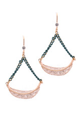 Gold earrings  inlaid with  gemstones on a white background