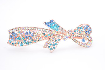 brooch with a bow of Gems isolated on white