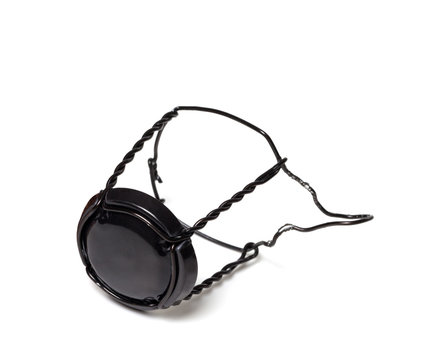Black muselet from bottle of champagne wine.
