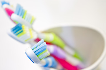 group tooth brush closeup white background shot
