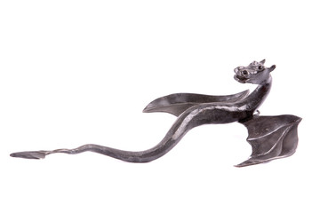 Forged dragon on a white background