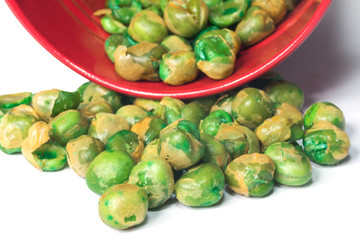 Green pea scattered on white
