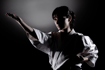 girl exercising karate - Powered by Adobe