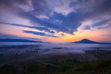 misty morning sunrise and road in mountain at Khao-kho Phetchabu