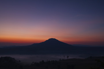 Misty morning sunrise in Khao Takhian Ngo View Point at Khao-kho