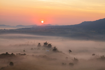 Misty morning sunrise in Khao Takhian Ngo View Point at Khao-kho