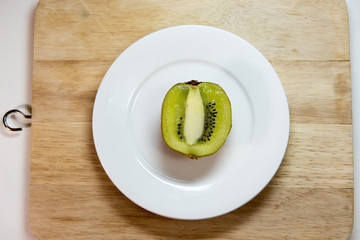 kiwi fruit isolated on block and white dish decoration decoratio