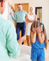 Brother is talking to her sister crying