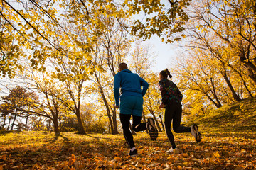 Cross-country running man and woman together