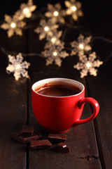 Hot chocolate and chocolate pieces.