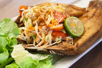 papaya salad with fried fish Thai cuisine spicy delicious