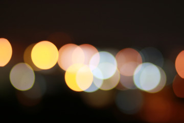 Lights blurred bokeh background from christmas night party