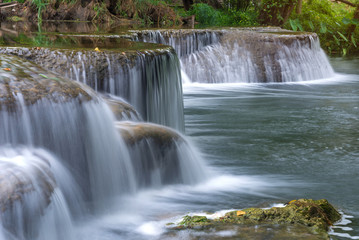 Fototapeta na wymiar Waterfall in rain forest at national park