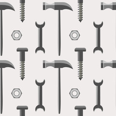 Seamless vector pattern with tools. Symmetrical background with hammers, screws, nuts and wrenches on the grey backdrop.