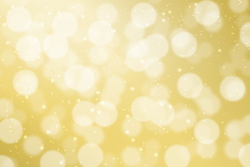 Blurred golden bokeh with sparkle effect for Cristmas background