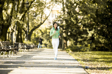 Young woman running in the park