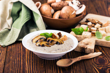 Hot homemade mushroom soup with fried mushrooms