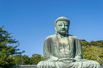 The Great Buddha with sky background at Kotokuin Temple , Kamakura in Japan