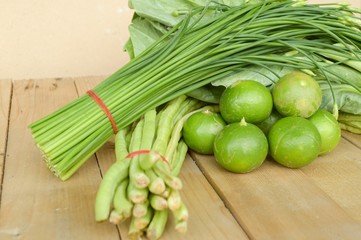 green Lime Yardlong bean Leek and kale on wood floor