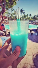 Carribean cocktail and swimming pool