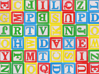Wooden alphabet blocks background