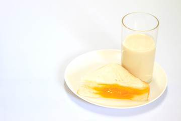 glass of milk and sandwich