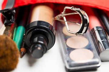 close up of cosmetic bag with makeup stuff