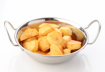 chunks of chips in metal pan