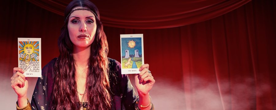 Fortune teller woman showing tarot cards