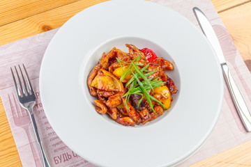 Chicken cooked with oranges 