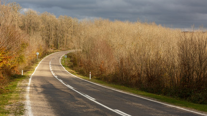 Fototapeta na wymiar Highway passing through rural ares and forests