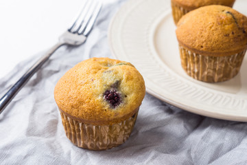 Muffins on the wooden table