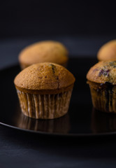 Muffins on the wooden table