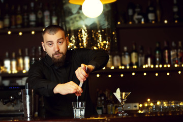 Bartender making cocktail