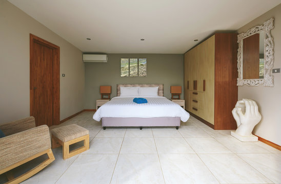 Beautiful Luxury Villa Bedroom Interior design with large window and decor