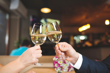 Couple Clanging Glasses