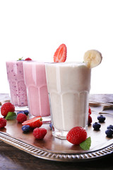 Milk shakes on white background