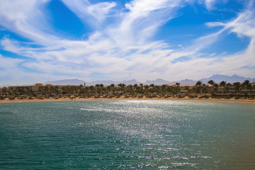 view of the sea and the lagoon beach Egypt against the sky and mountains