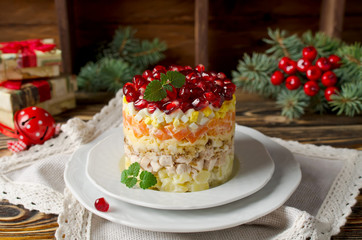 Layered salad from vegetables on the holiday table © vkuslandia