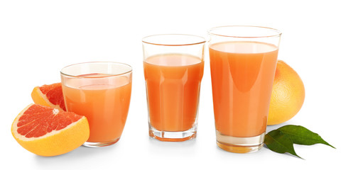 Citrus juice and fresh fruits isolated on white