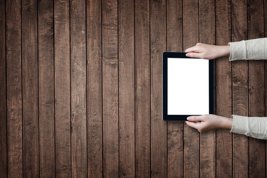  female hands holding digital tablet