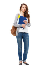 Young happy student isolated on white.