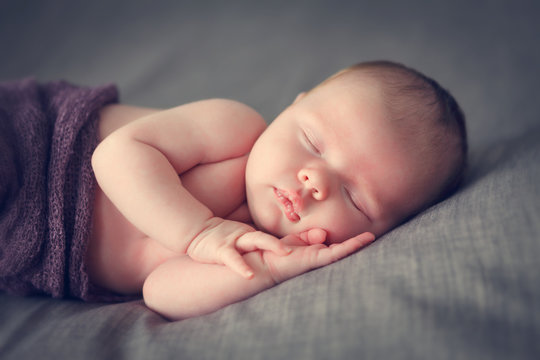 sleeping newborn baby