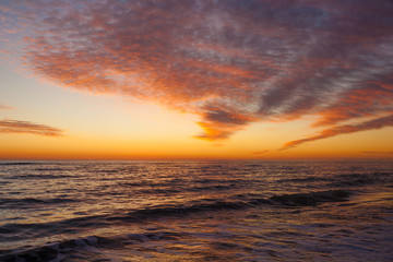 Naklejka na ściany i meble Colorful dawn over the sea, Sunset