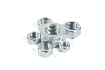 Metal Nuts Of Different Sizes Isolated On White Background