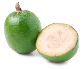 One whole and a half feijoa isolated on white background